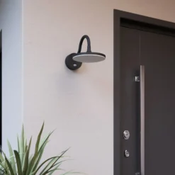 Arcchio LED-Außenwandleuchte Fineria, Ø22 cm, Metall, Sensor