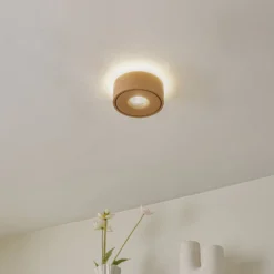 Arcchio LED-Deckenlampe Rotari, braun, up und down