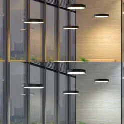 Arcchio LED-Hängelampe Aleksi, Ø 60 cm, schwarz, Metall, CCT