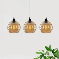 Hängelampe Gold 012, gold-transparent, Glas 3-flammig linear