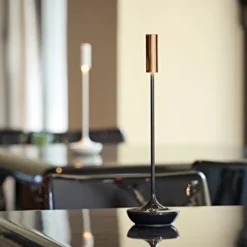 LED-Akkutischleuchte Nucandle, schwarz/kupfer, IP54, dimmbar