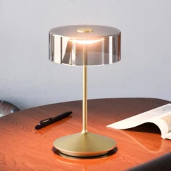 LED-Akkutischleuchte Numotion, gold, Glas, IP54, dimmbar