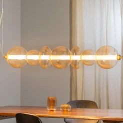 LED-Hängelampe Daphne, Glas amber-transparent, Länge 118 cm
