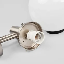 Lindby Außenwandlampe Nada, Edelstahl, Glas, Sensor, E27