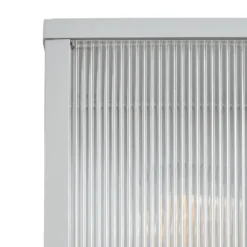 Lindby Außenwandlampe Peldar, grau/geriffelt, 26 cm, Sensor