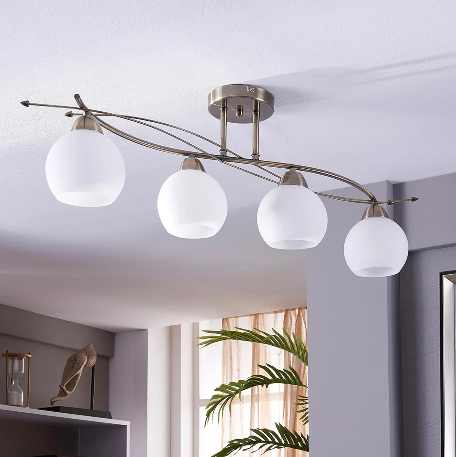 Lindby Deckenlampe Leanda, 80 cm, vierflammig, Metall, Glas