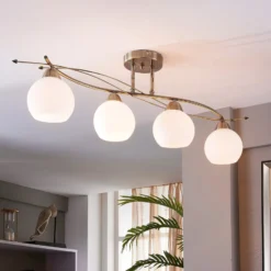 Lindby Deckenlampe Leanda, 80 cm, vierflammig, Metall, Glas