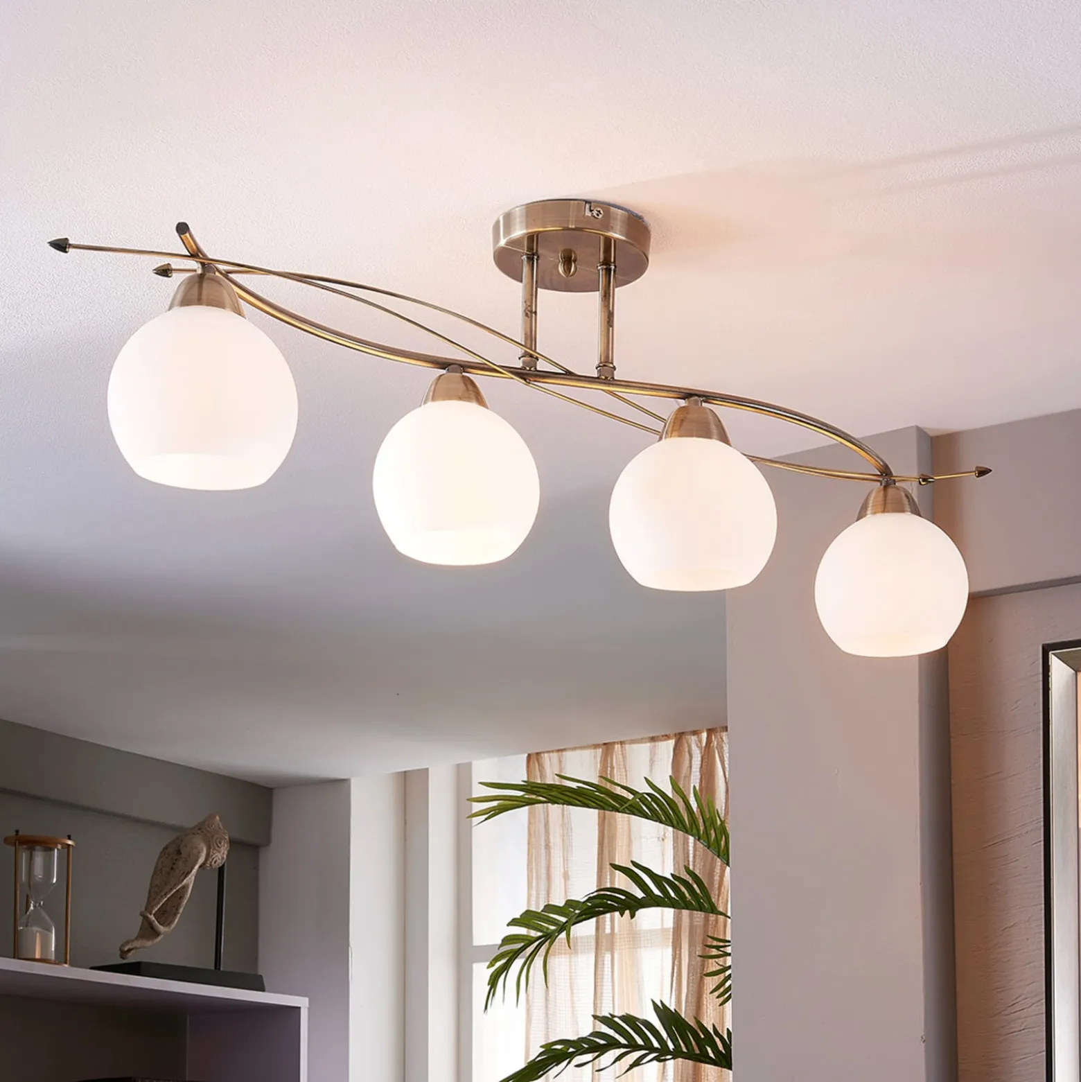 Lindby Deckenlampe Leanda, 80 cm, vierflammig, Metall, Glas