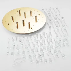 Lindby Deckenleuchte Gillion, 8-flg., gold, Kristall, Ø 55cm