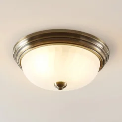 Lindby Deckenleuchte Pakka, messingfarben, Glas, 31 cm, E27