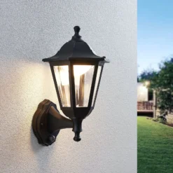 Lindby LED-Außenwandlampe Iavo, Sensor, schwarz, 38 cm, IP44