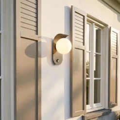 Lindby LED-Außenwandleuchte Lacie, Sensor, schwarz/weiß, Alu