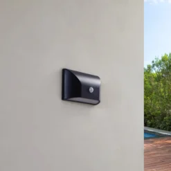 Lindby LED-Außenwandleuchte Siana, schwarz, PC, Sensor
