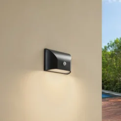 Lindby LED-Außenwandleuchte Siana, schwarz, PC, Sensor