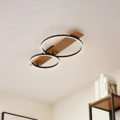 Lindby LED-Deckenlampe Galad, schwarz, Holz, 2-flg., 75 cm