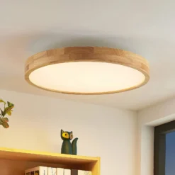 Lindby LED-Deckenlampe Lanira, Ø 60 cm, Holz, Remote, CCT