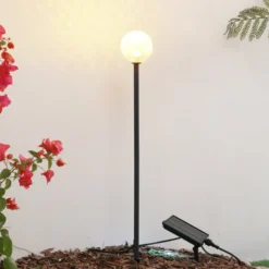 Lindby LED-Solarleuchte Brindley, schwarz, Glas, IP65