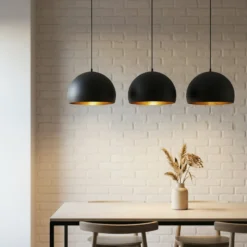 Lindby Pendellampe Tarjei, Länge 120cm, schwarz/gold, Metall