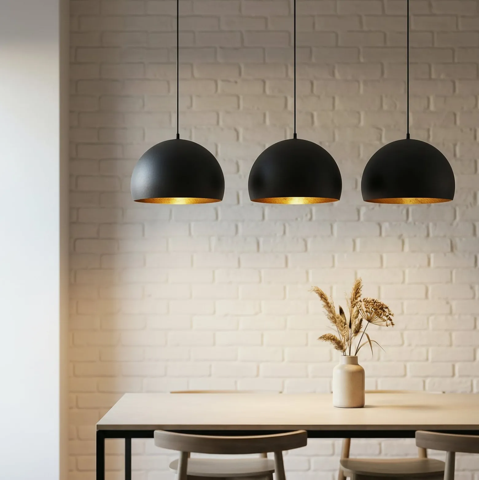 Lindby Pendellampe Tarjei, Länge 120cm, schwarz/gold, Metall