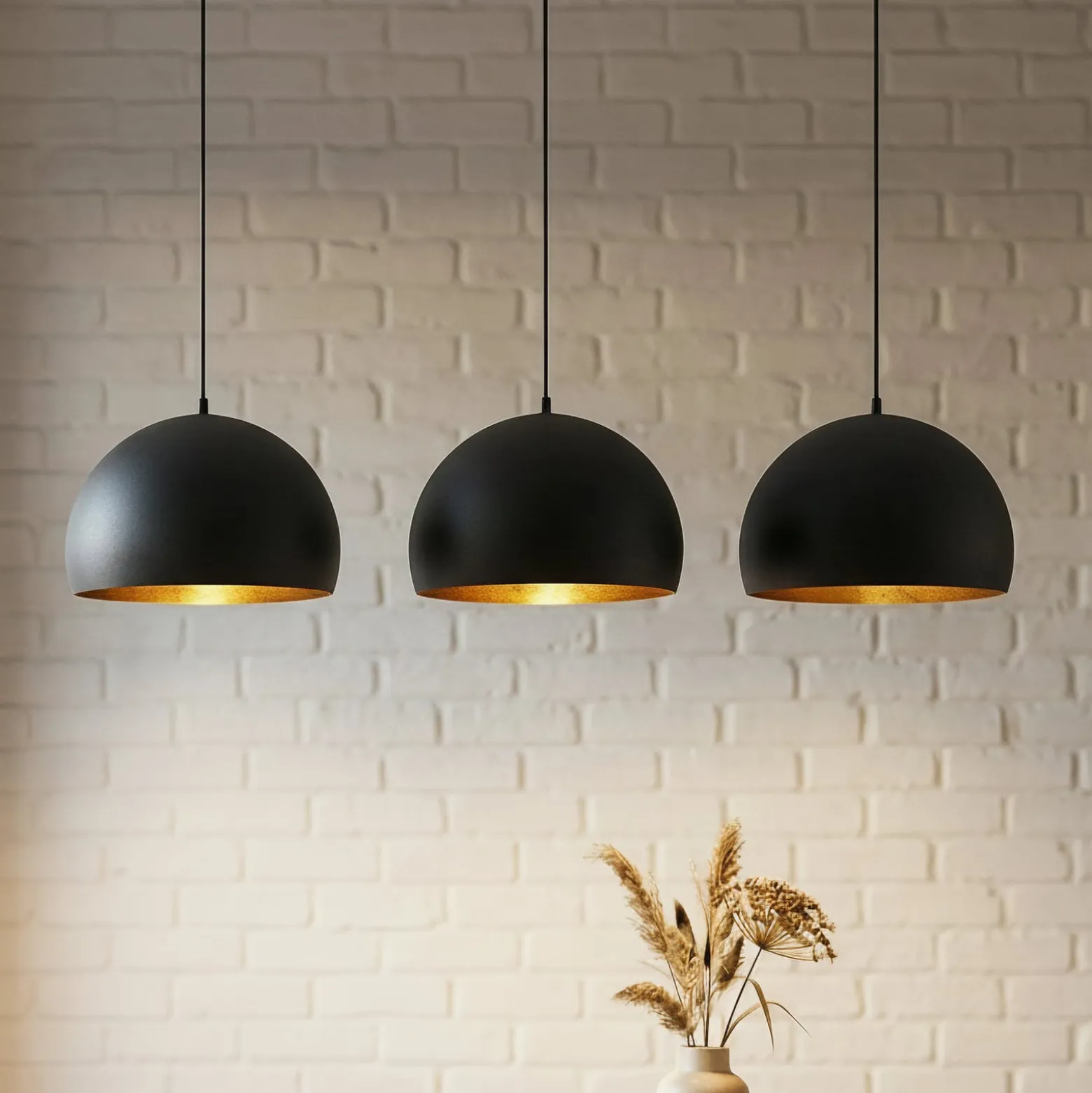 Lindby Pendellampe Tarjei, Länge 120cm, schwarz/gold, Metall