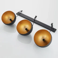 Lindby Pendellampe Tarjei, Länge 120cm, schwarz/gold, Metall