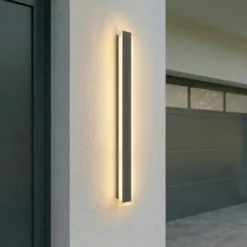 Lucande LED-Außenwandlampe Ilora, schwarz, 100 cm, CCT, IP65