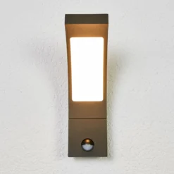 Lucande LED-Außenwandlampe Juvia, Sensor, 27 cm, grau, IP54