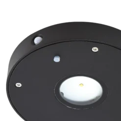 Lucande LED-Solar-Wandlampe Tavon, rund, schwarz, Sensor