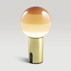 MARSET Akku-Tischlampe Dipping Light, creme/messing, dimmbar