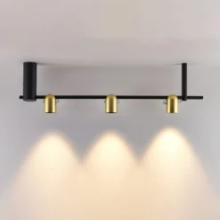 Molto Luce Hängelampe Nuun SD, schwarz/goldfarben, 3-flg.