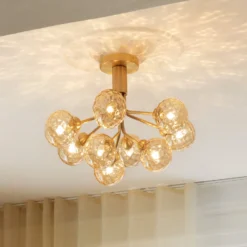 Nuura Deckenlampe Apiales 9, Ø 60 cm, messing-/goldfarben