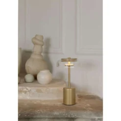 Nuura LED-Akku-Tischlampe Blossi, Höhe 26 cm goldfarben/klar