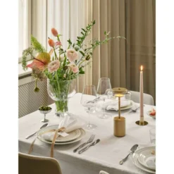 Nuura LED-Akku-Tischlampe Blossi, Höhe 26 cm goldfarben/klar