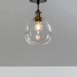 PR Home Deckenleuchte Omega, klar/messing/schwarz, Ø 20 cm