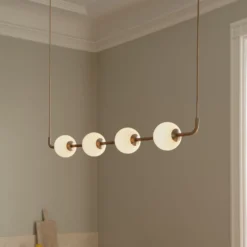 UMAGE LED-Hängeleuchte Audrey LINEAR, messing, 118 cm 4-flg.